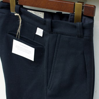 WOOL FLANNEL PLEATED TROUSER