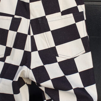 IRREGULAR CHECKERED FLAG STRAIGHT TROUSERS