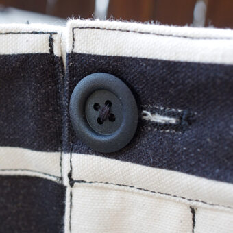 IRREGULAR CHECKERED FLAG STRAIGHT TROUSERS