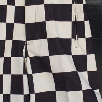 IRREGULAR CHECKERED FLAG WIDE TROUSERS