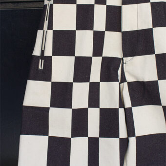 IRREGULAR CHECKERED FLAG WIDE TROUSERS