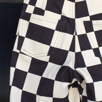 IRREGULAR CHECKERED FLAG WIDE TROUSERS