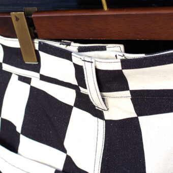 IRREGULAR CHECKERED FLAG WIDE TROUSERS