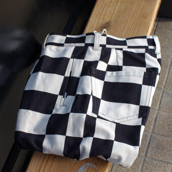 IRREGULAR CHECKERED FLAG WIDE TROUSERS