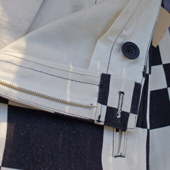 IRREGULAR CHECKERED FLAG WIDE TROUSERS