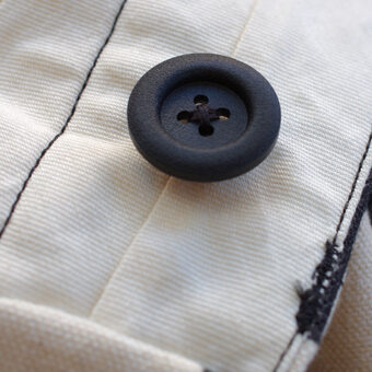 IRREGULAR CHECKERED FLAG WIDE TROUSERS